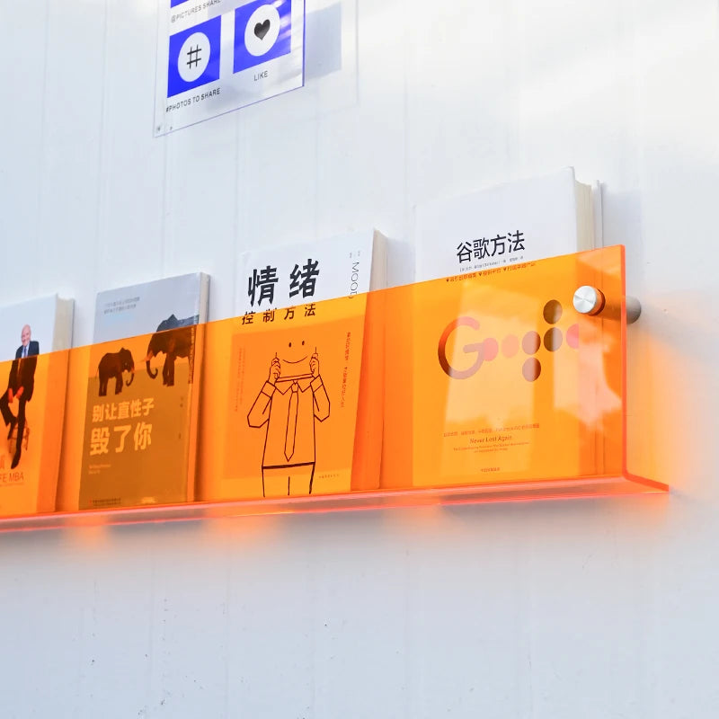 亚克力书架，橙色，亚克力展示架，简约风格，书店装饰，壁式书架，。